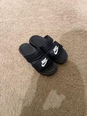 Nike Women’s Black Slide Sandals with White Swoosh Strap
